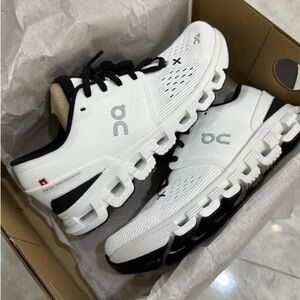 On Running Black and White Athletic Shoes